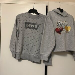 Girls gray Levi’s sweaters. One with the hood is more cropped.